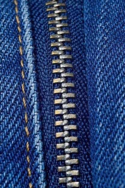 Premium Photo Metal Zipper On Blue Jeans Macro