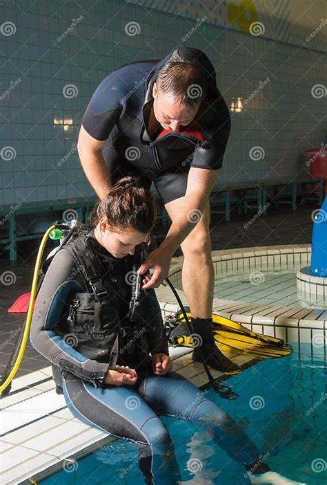 Scuba Diving Course Pool Teenager Girl With Instructor In The Water