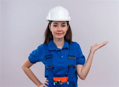 Confiado Joven Constructor Con Casco De Seguridad Blanco Y Uniforme