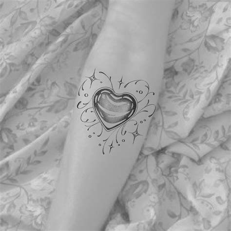 Tattoo Tickets By Tattooist Kelly Flash Designs Heart Ornament Tattoo