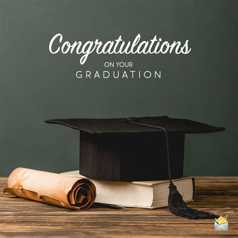 Graduation wish on image with graduation hat, a book and an old parchm ...