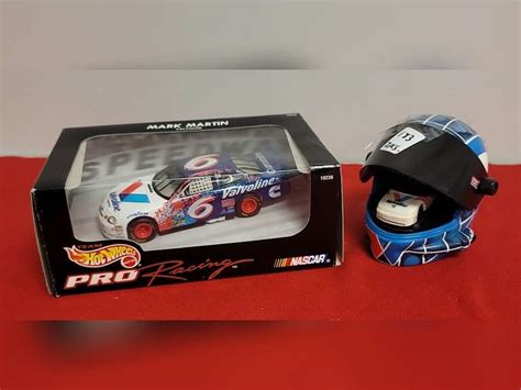 Valvoline Hot Wheels Mark Martin Race Car Collectible And A Valvoline Mini Car In A Helmet