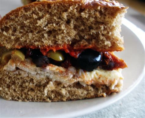 libyan food: Egg Omelette Sandwich, with Cheese, Sundried Tomatoes, Harissa and Olives