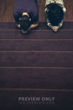 A Man And Woman Kneeling Before An Altar Stock Photos Prixel Creative