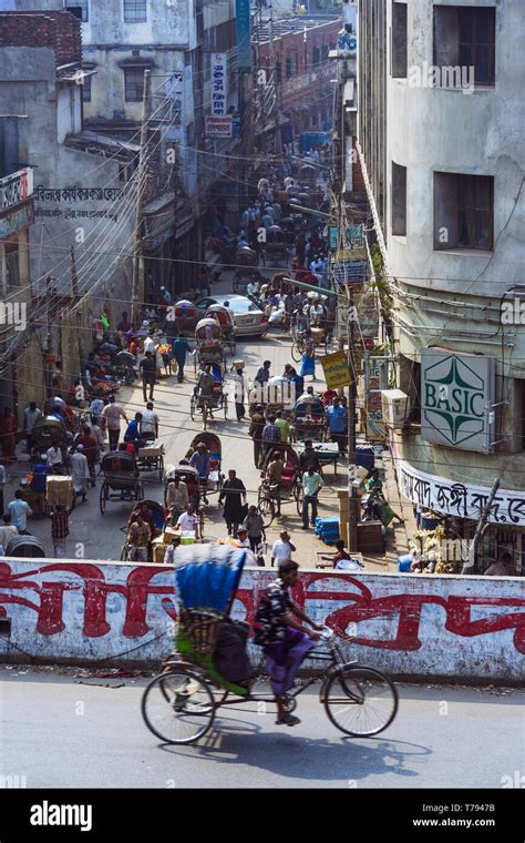 Dhaka Bangladesh A Man Rides A Rickshaw On A Flyover Pass Over Old