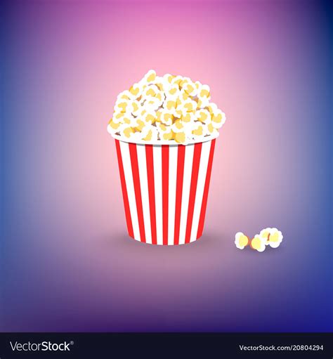 Carton bowl full of popcorn on colorful background