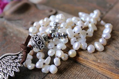 Long White Pearl Angel Wing Knotted Bohemian Necklace - Ever Designs Jewelry