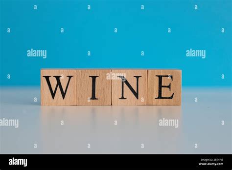 Wine Word Written On Wood Cube With Blue Background Stock Photo Alamy