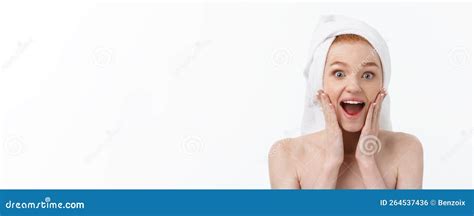 Surprised Beautiful Young Woman After Bath With A Towel On Her Head