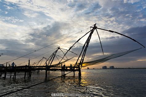 Photo Of Chinese Fishing Nets At Sunset Kerala India