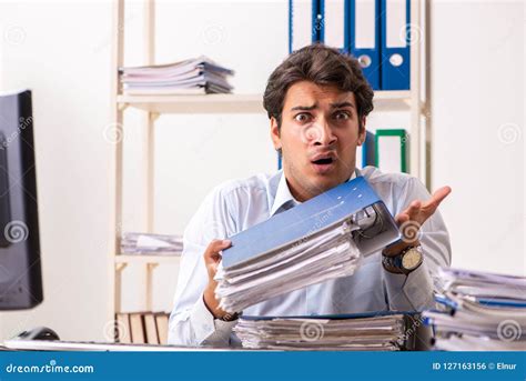 Overloaded Busy Businessman Having Lunch At Work Stock Image