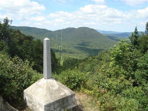 Border clearing and marker between USA (Vermont, left) and Canada ...