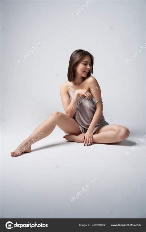 Sensual Brunette Female In Satin Night Dress Stock Photo Pavel Kolotenko 239269822