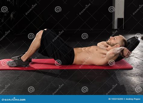 Man Doing Crunches Exercise with Weight Stock Image - Image of heavy ...