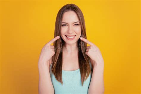 Portrait Of Cheerful Cute Lady Indicate Forefingers Toothy Beaming