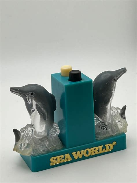 Seaworld Dolphin Plastic Push Button Salt And Pepper Shakers Etsy