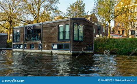 Traditional Floating Boat House in Amsterdam Canals, the Netherlands ...