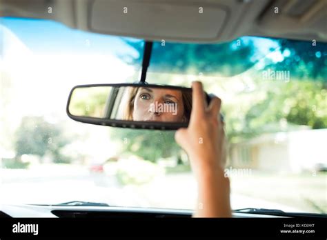 Woman Adjusting Car Mirror Hi Res Stock Photography And Images Alamy