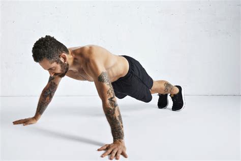 How to Do Wide-Grip Push-Ups (Form and Benefits) - Steel Supplements