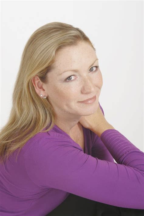 Smiling Blonde Stock Photo Image Of Woman Smiling Sitting