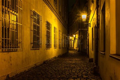 Old Cobbled Streets And Buildings Of Prague Old Town At Night In Stock
