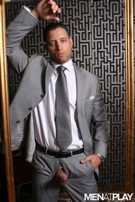 Naked Bodybuilder And His Twin Brother In A Suit Show Off Their Big