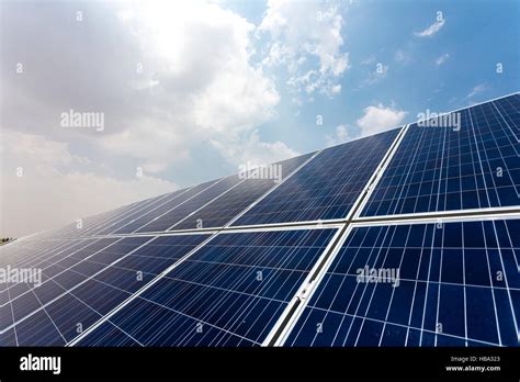 Solar Panels Under Blue Sky Stock Photo Alamy