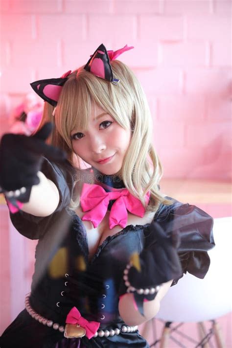 Japan Anime Cosplay Portrait Of Girl Cosplay In Pink Room Background