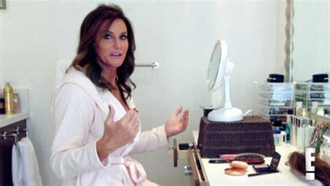 Caitlyn Jenner Poses With Her Plastic Surgeon With Signed Copy Of ...