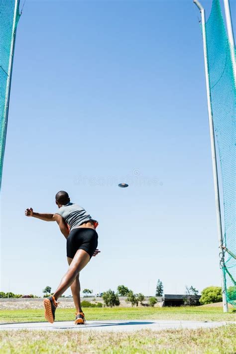 Athlete Throwing Discus In Stadium Stock Image Image Of Sportsman