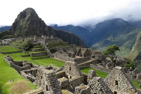 To how many meters of height is Machu Picchu?