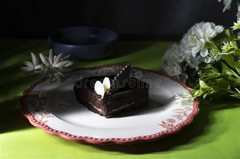 Plate With Slice Of Tasty Homemade Chocolate Cake On Table Stock Image