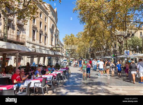 Barcelona Catalunya spain Las Ramblas tourists walking along Las Ramblas Barcelona las ramblas ...