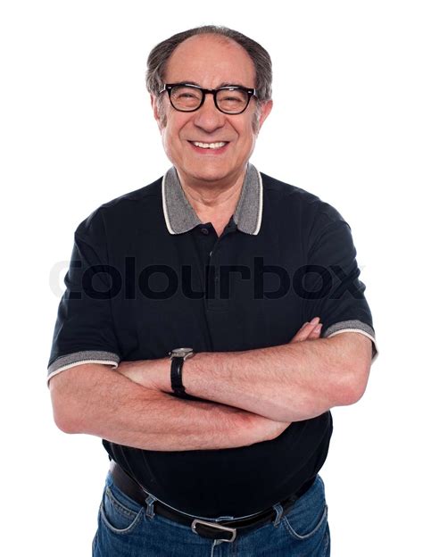 Cheerful Old Man Standing With Arms Crossed Stock Image Colourbox