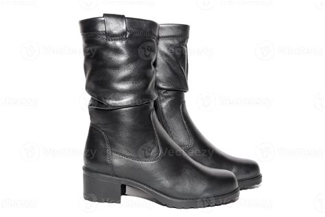 Women's leather black boots 13619830 Stock Photo at Vecteezy