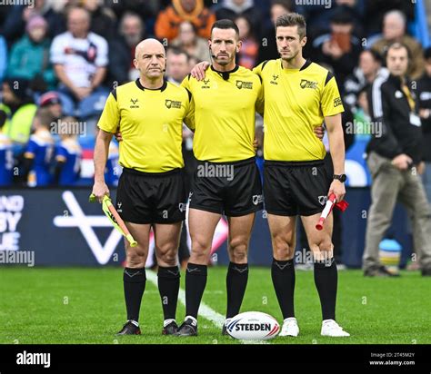 Referee Jack Smith And Touch Judges Chris Kendall And Richard Thompson