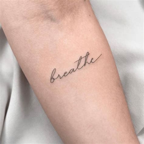 Breathe Lettering Tattoo On The Inner Forearm