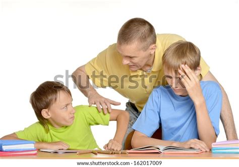 Father Helping His Sons Their Homework Foto De Stock 162017009