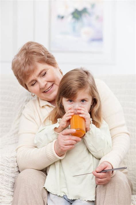 Pretty Grandparent Is Taking Care Of Child Stock Photo Image Of