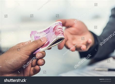 Businessman Giving Money Indian Rupee Currency Stock Photo