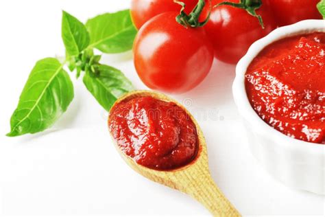 A Spoonful Of Tomato Sauce Fresh Green Basil Tomato Sauce Stock Photo