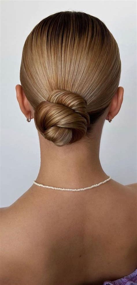 Amazing Ways To Style An Updo In Sleek Twisted Low Bun In