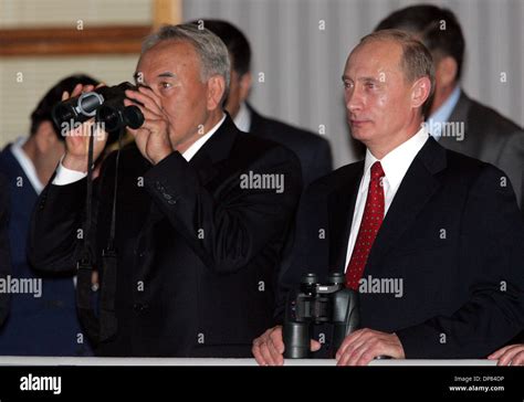 Russian President Putin And Kazakhstani President Nazarbayev Orserving