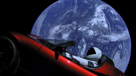 Elon Musk's Tesla Roadster leaving Earth's orbit. : r/pics