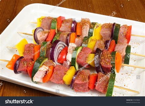 Preparation Of Delicious Shish Kebab - Meat On A Stick With Vegetables. Meat, Spices, Vegetables ...