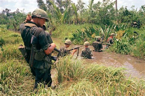 Us Soldiers Of The 9th Infantry Division Wade Through Marshland During A Operation On South