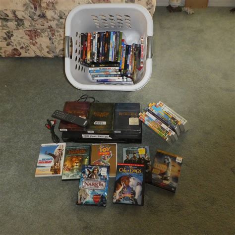 Lot Sony Dvd Player And Basket Full Of Dvd Movies Dvd Player