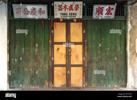 Entrance To A Chinese Workshop A Carpenter In The Padungan District Of