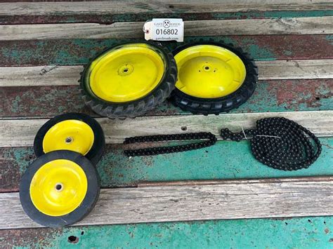 Assorted John Deere Pedal Tractor Parts - Gavel Roads Online Auctions