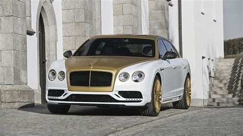 Sedán dorado y blanco Mansory Bentley Continental Flying Spur